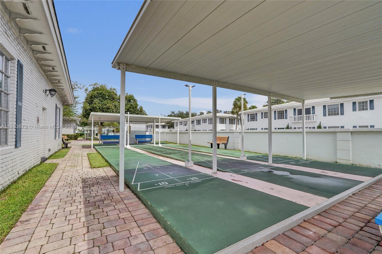 2181 Northeast 67th Street, Unit 622 Fort Lauderdale, FL 33308 - Photo 22 of 28 swimming pool view with a outdoor seating space
