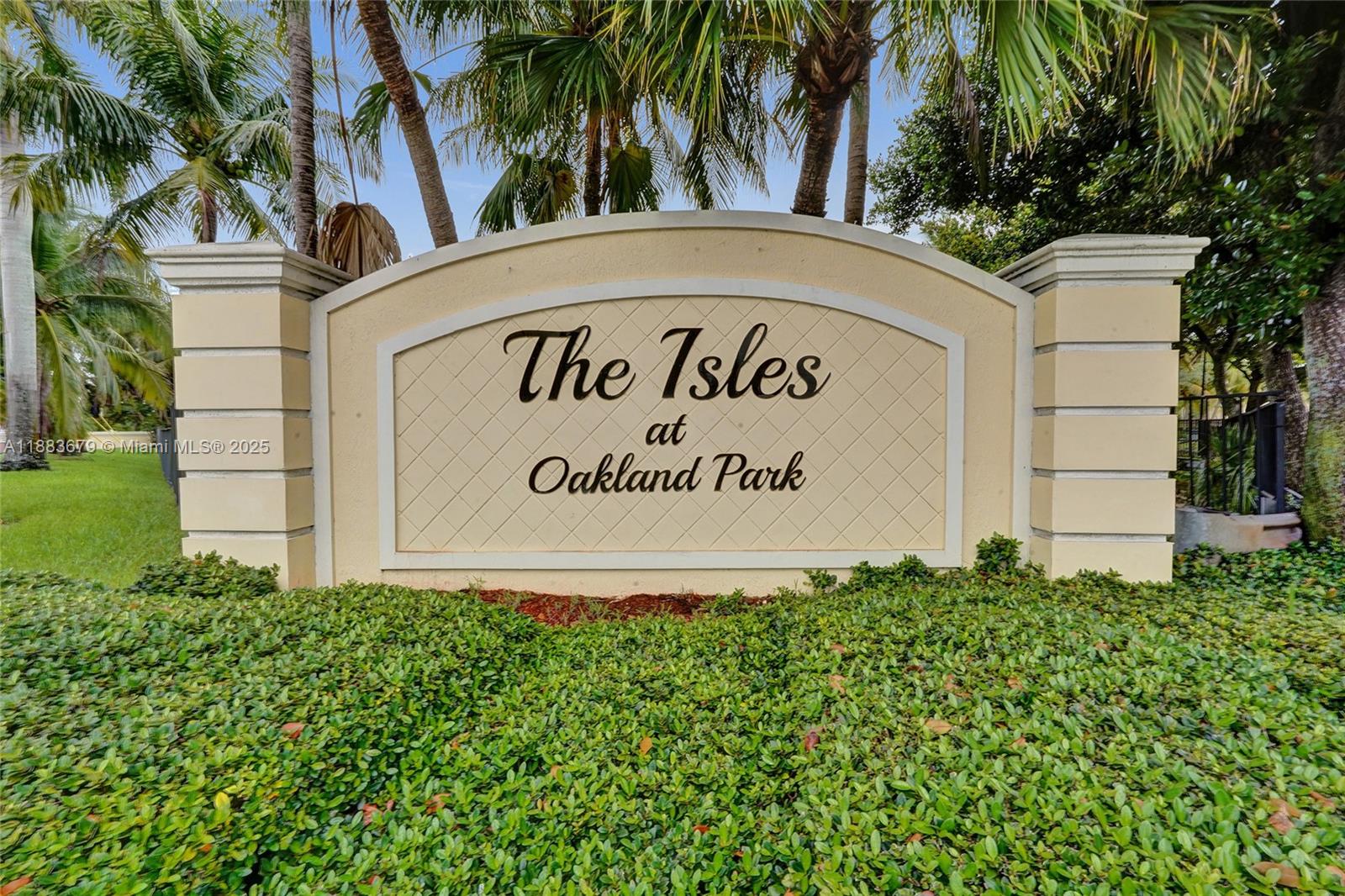 2181 Northeast 67th Street, Unit 622 Fort Lauderdale, FL 33308 - Photo 27 of 28 a sign on the side of the road