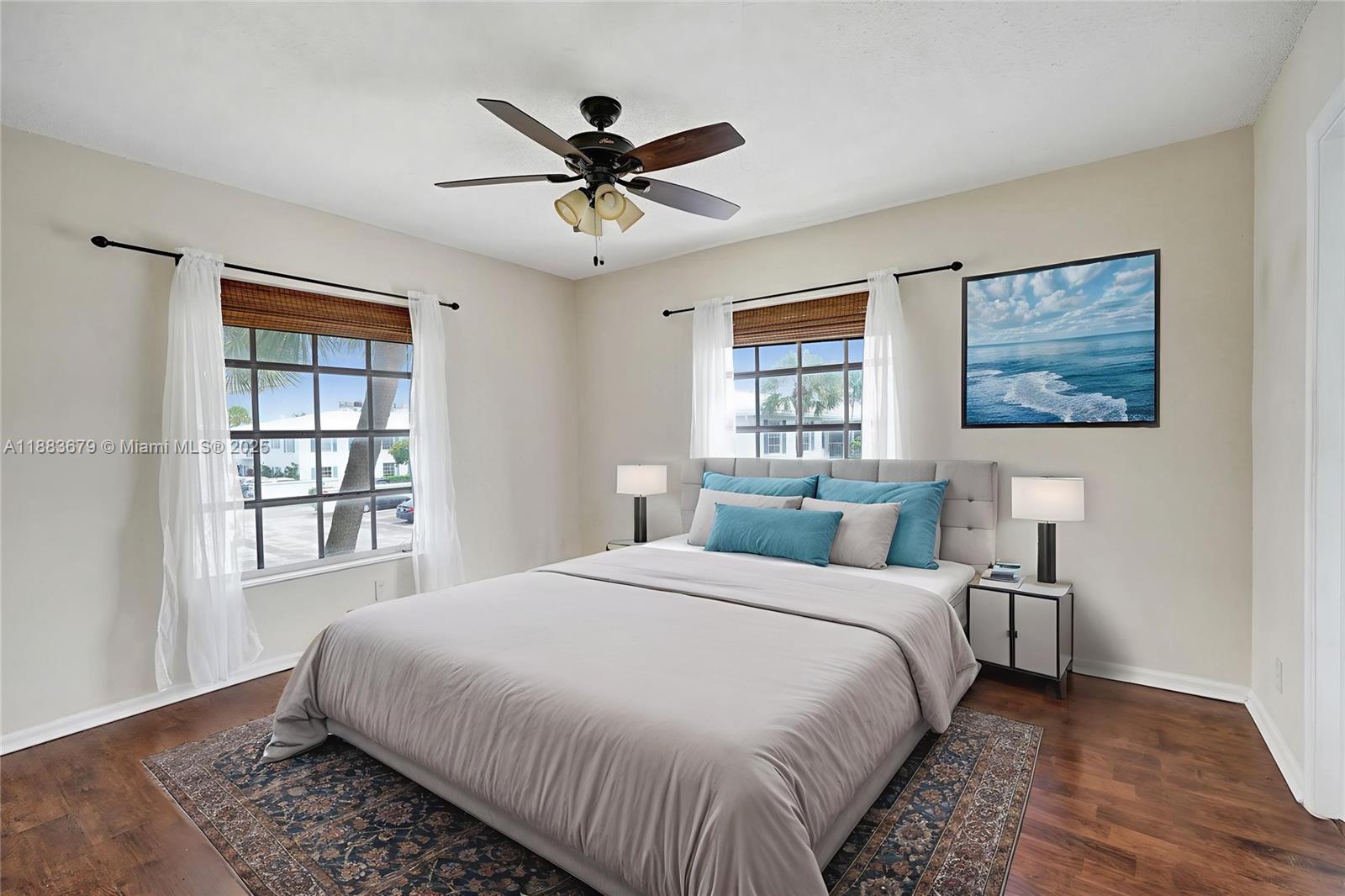 2181 Northeast 67th Street, Unit 622 Fort Lauderdale, FL 33308 - Photo 3 of 28 a bedroom with a large bed and a window