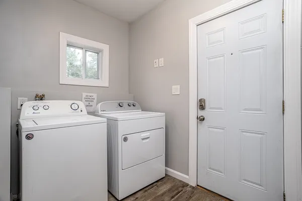 a utility room with dryer and washer