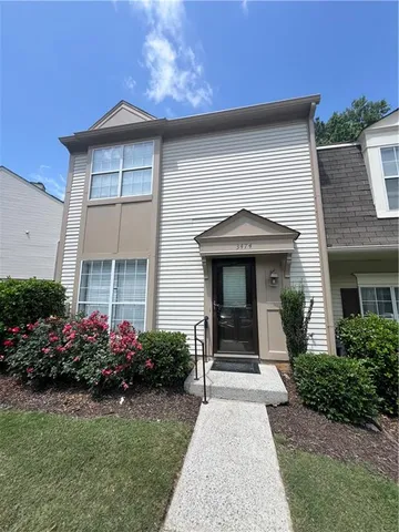 a front view of a house with a porch