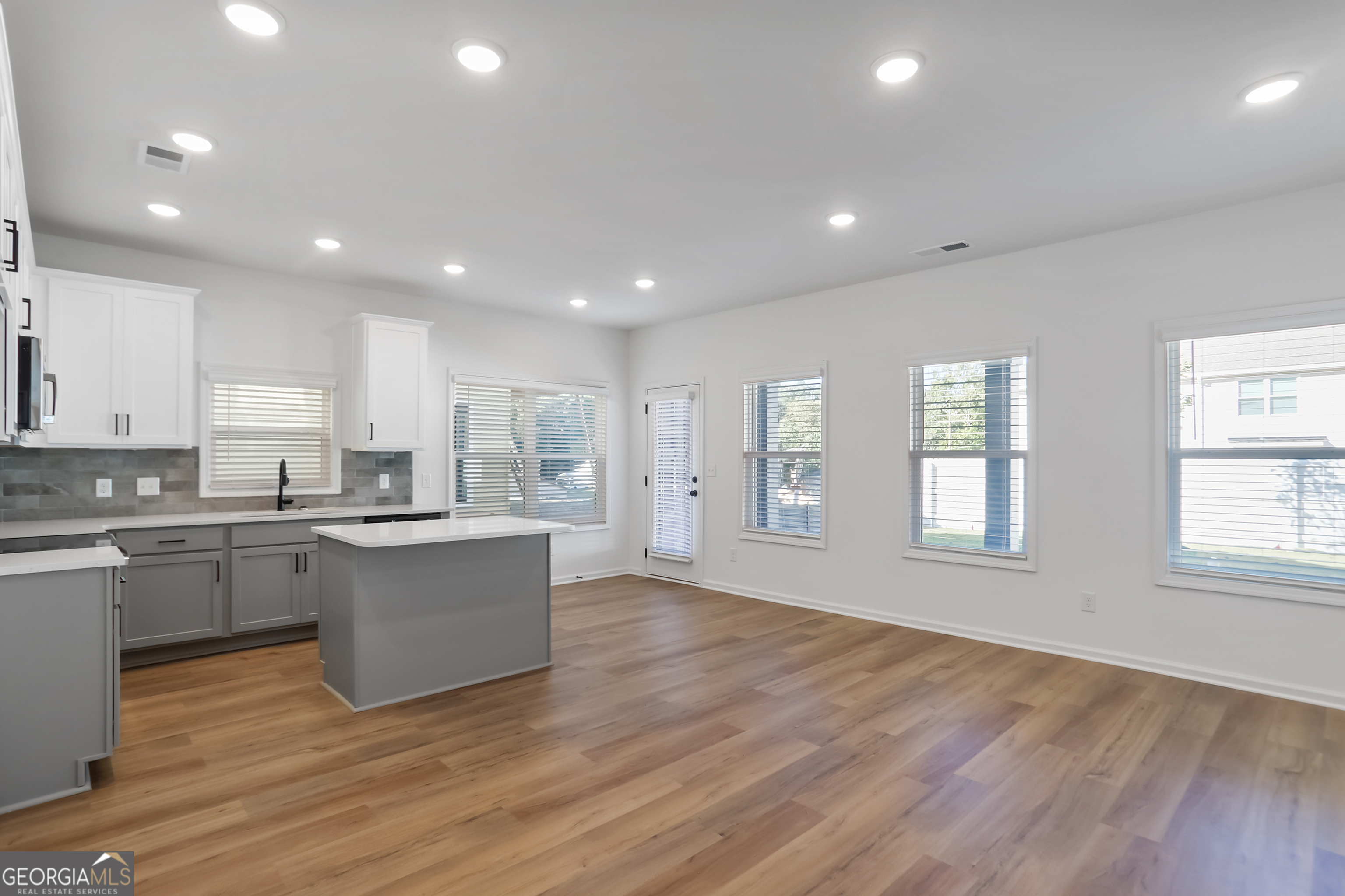 164 Jackson Circle, Unit 18 Cleveland, GA 30528 - Photo 6 of 27 Kitchen cabinets will all be white. 42" upper, soft close and under cabinet lighting included.