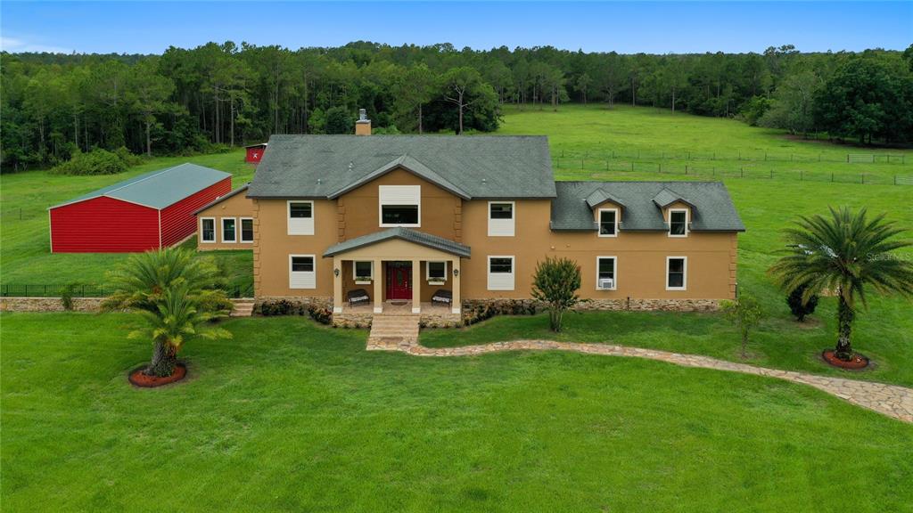 6822 South Fork Ranch Road Clermont, FL 34714 - Photo 1 of 1 Ariel View of the Main House