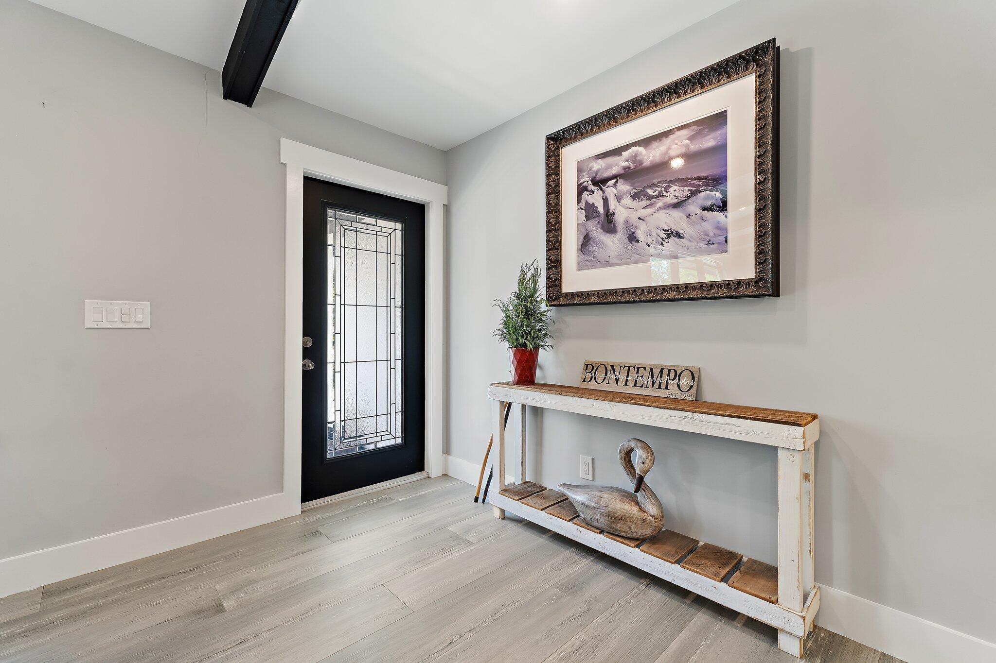 11845 165th Road North Jupiter, FL 33478 - Photo 16 of 68 an entryway with wooden floor