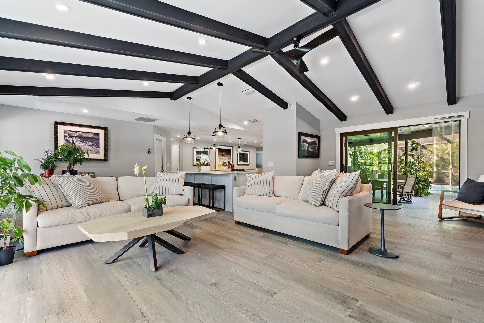 11845 165th Road North Jupiter, FL 33478 - Photo 20 of 68 a living room with furniture and a large window