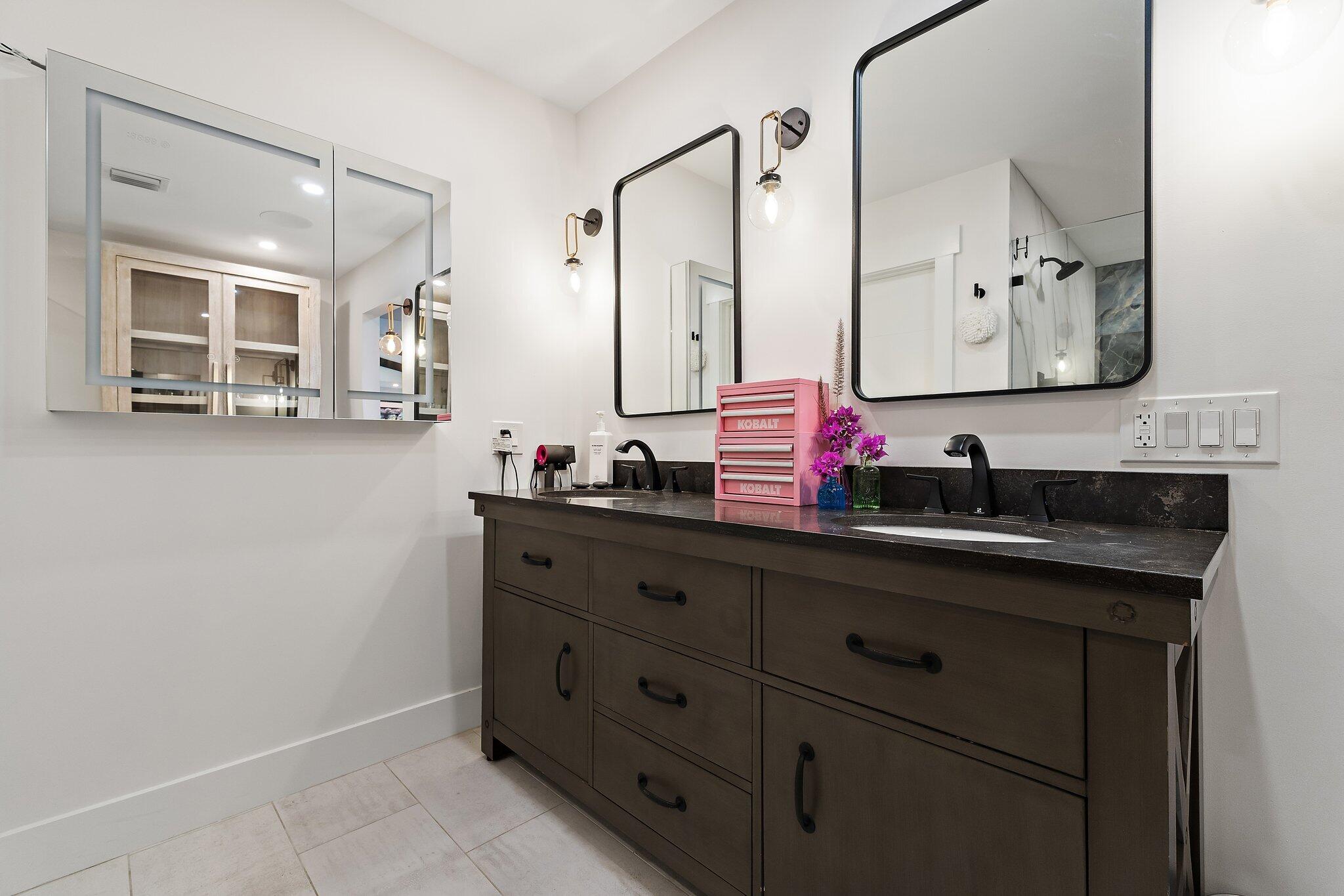 11845 165th Road North Jupiter, FL 33478 - Photo 37 of 68 a bathroom with a granite countertop sink mirror and double