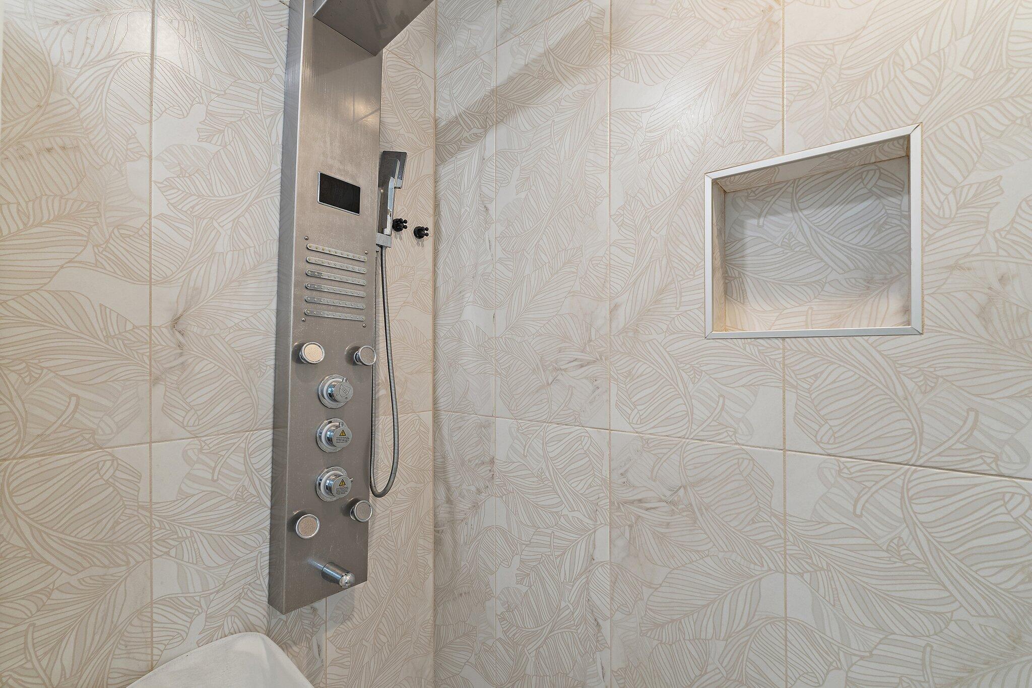 11845 165th Road North Jupiter, FL 33478 - Photo 48 of 68 a bathroom with a shower and a mirror