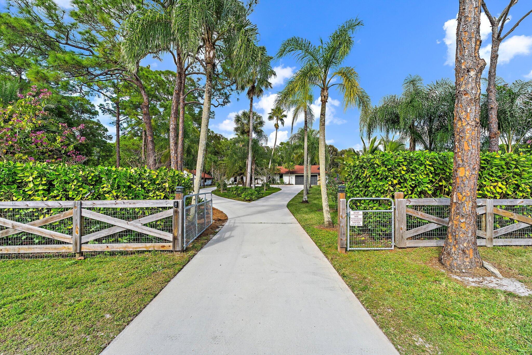 11845 165th Road North Jupiter, FL 33478 - Photo 6 of 68 a view of outdoor space yard and green space