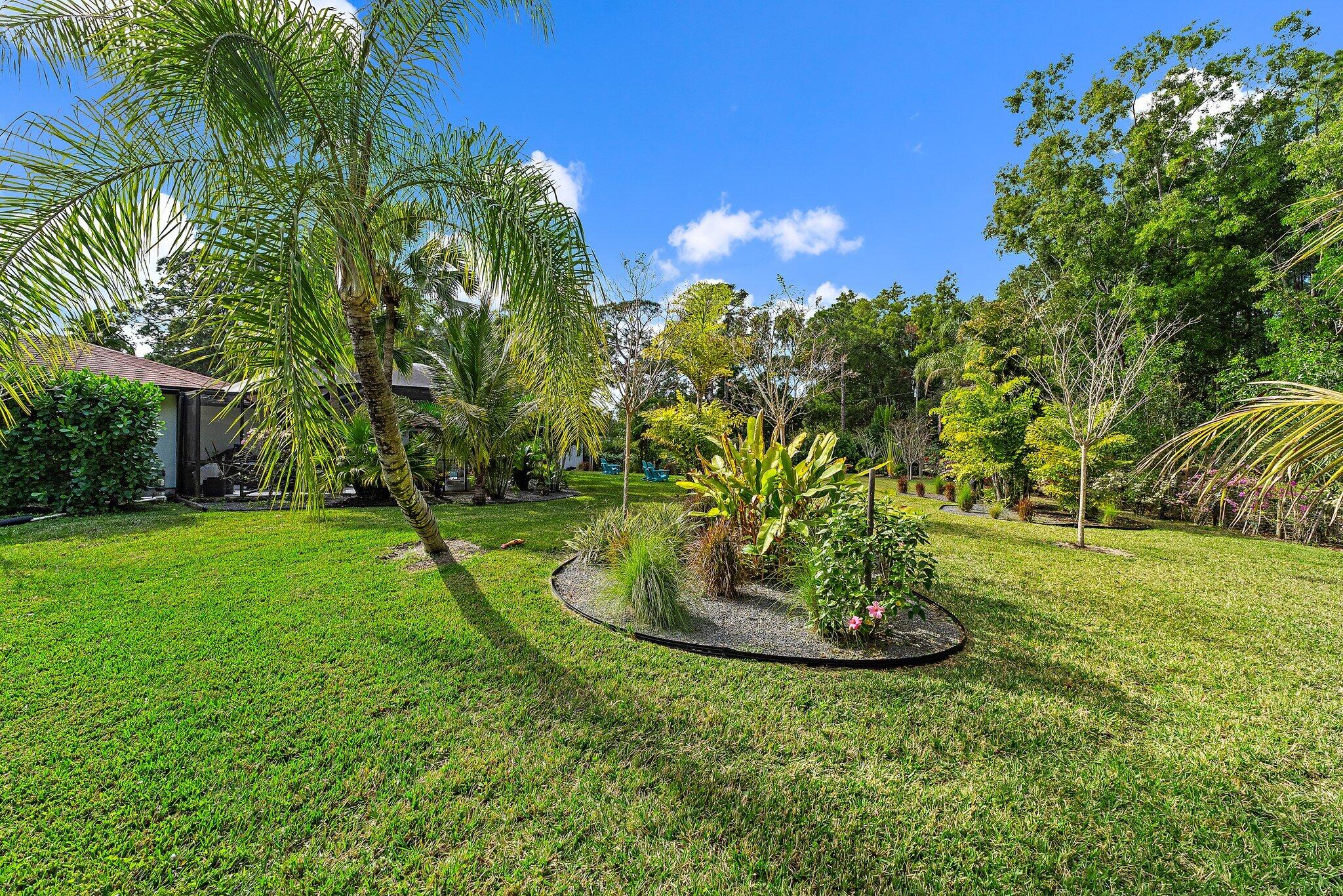 11845 165th Road North Jupiter, FL 33478 - Photo 67 of 68 a view of a backyard