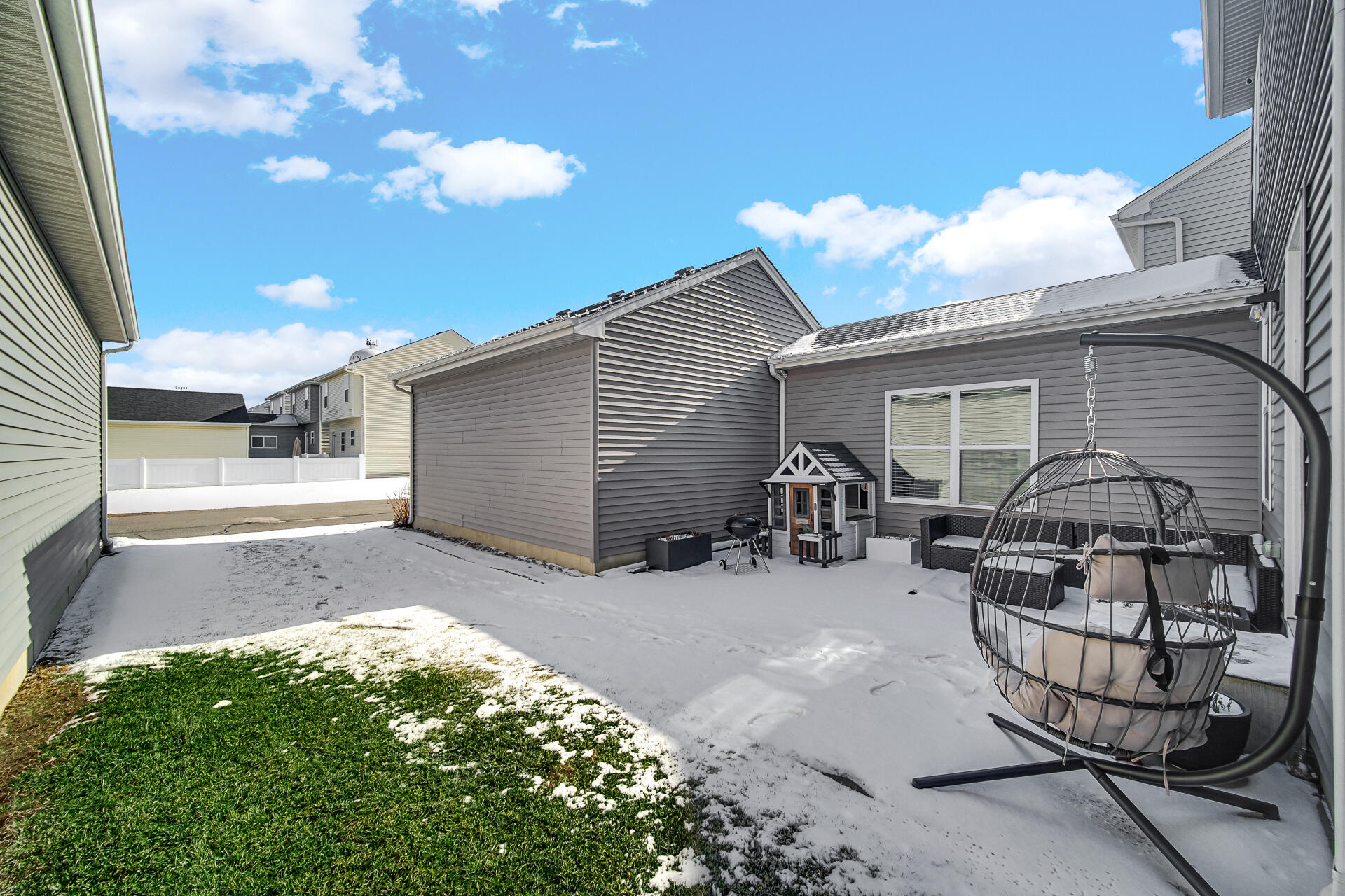 12728 Ellsworth Street Crown Point, IN 46307 - Photo 29 of 30 a view of a backyard with sitting area and furniture