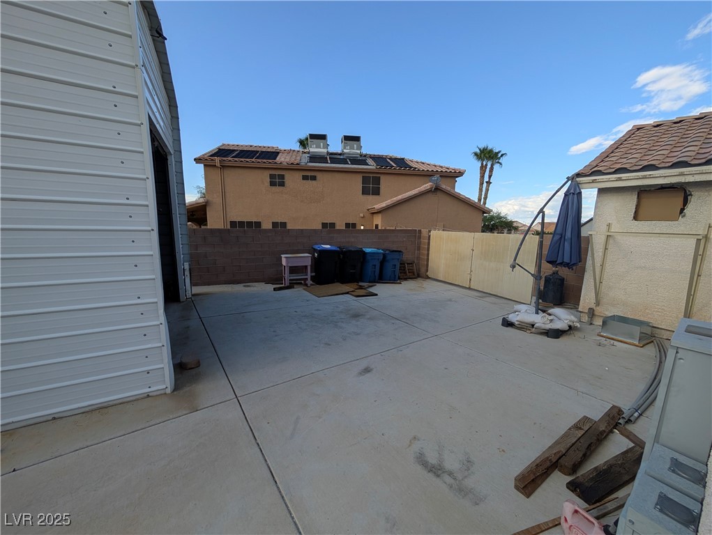 104 Appian Way Henderson, NV 89002 - Photo 19 of 52 Fenced backyard featuring a patio area
