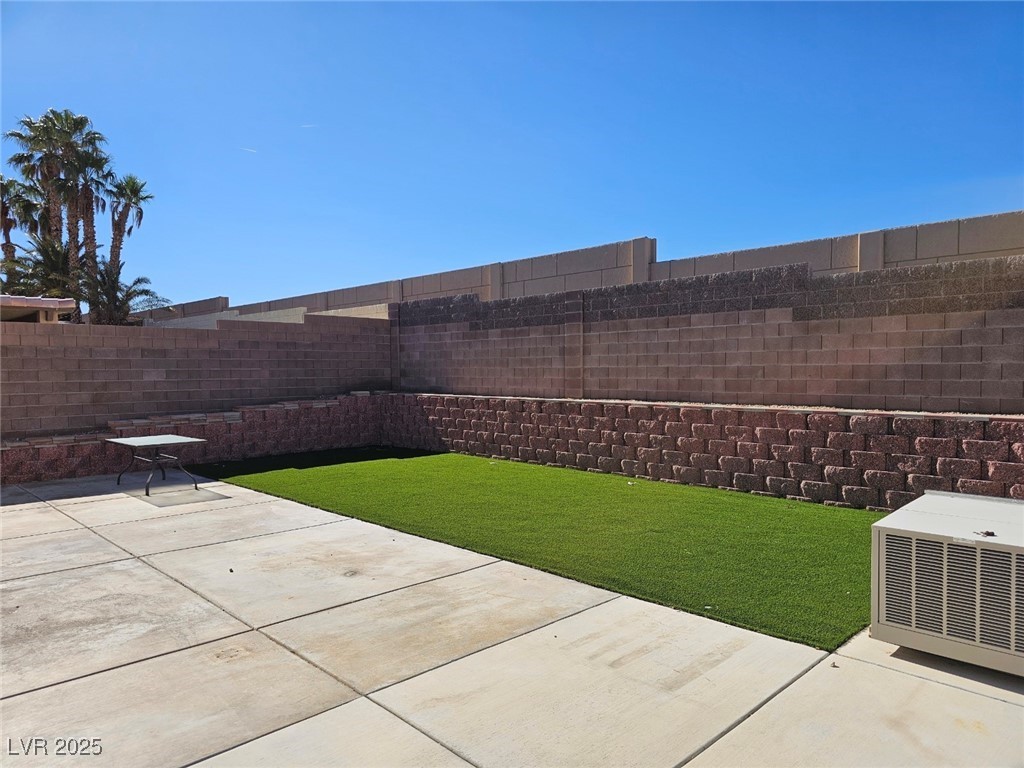 104 Appian Way Henderson, NV 89002 - Photo 47 of 52 Fenced backyard with a patio area