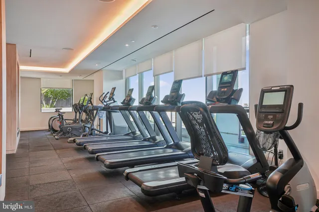 a view of a patio with swimming pool table and chairs