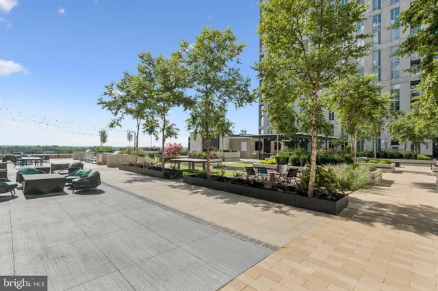 a view of a chairs and table in a patio