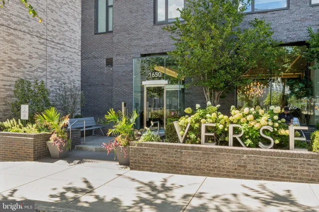 a view of street with parked cars
