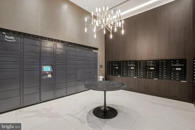 a bathroom with a sink toilet double vanity and shower