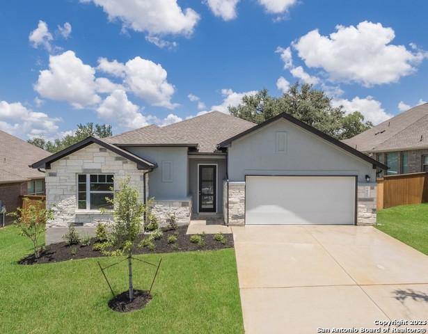 a house view with a garden space