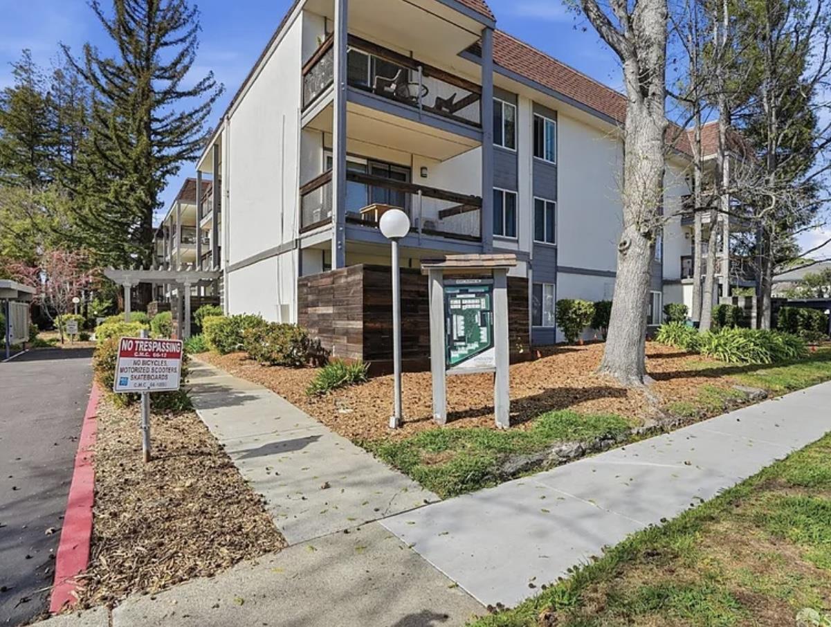 4081 Clayton Road, Unit 235 Concord, CA 94521 - Photo 2 of 19 a view of a building with a yard