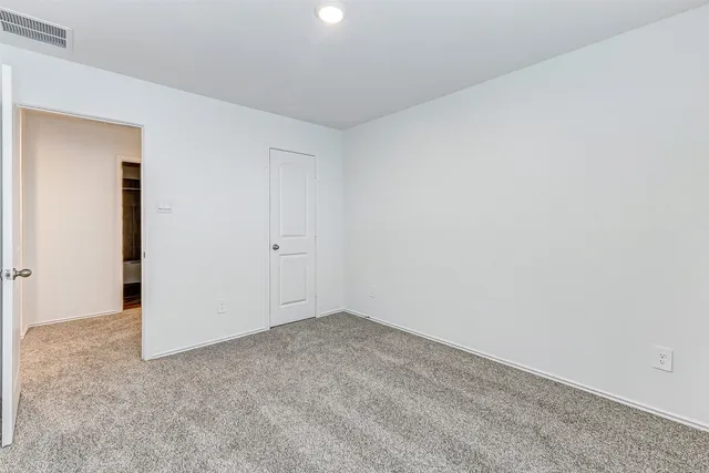 an empty room with an entryway