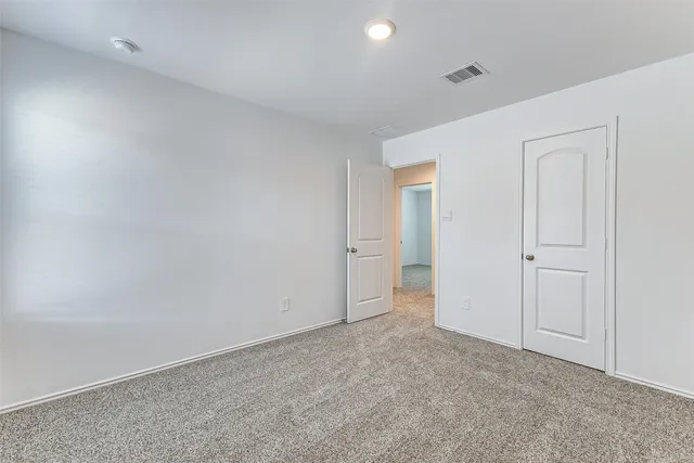 an empty room with an entryway