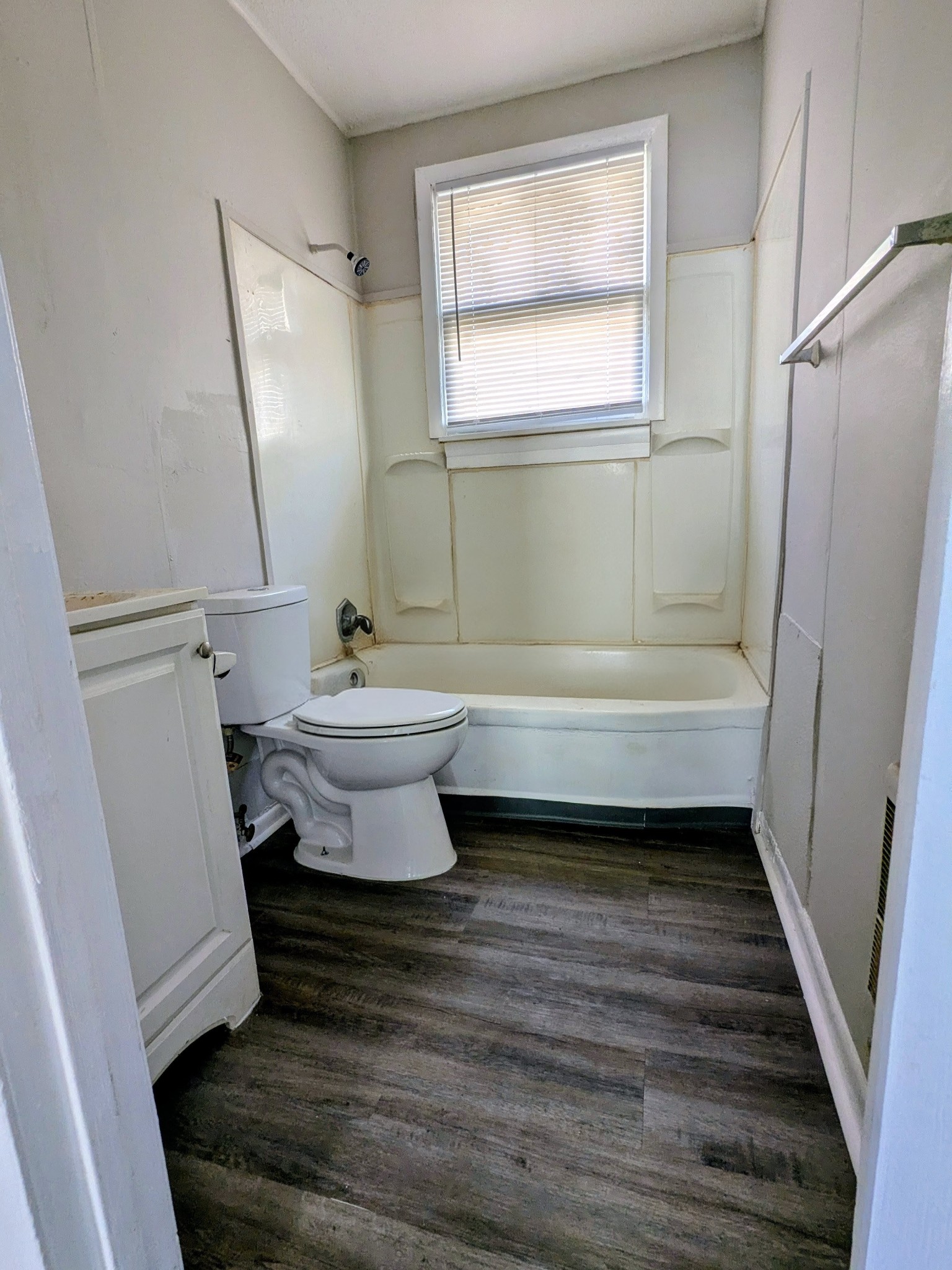 118 Rains Avenue, Unit 1 Nashville, TN 37203 - Photo 6 of 7 a bathroom with a sink a toilet and shower
