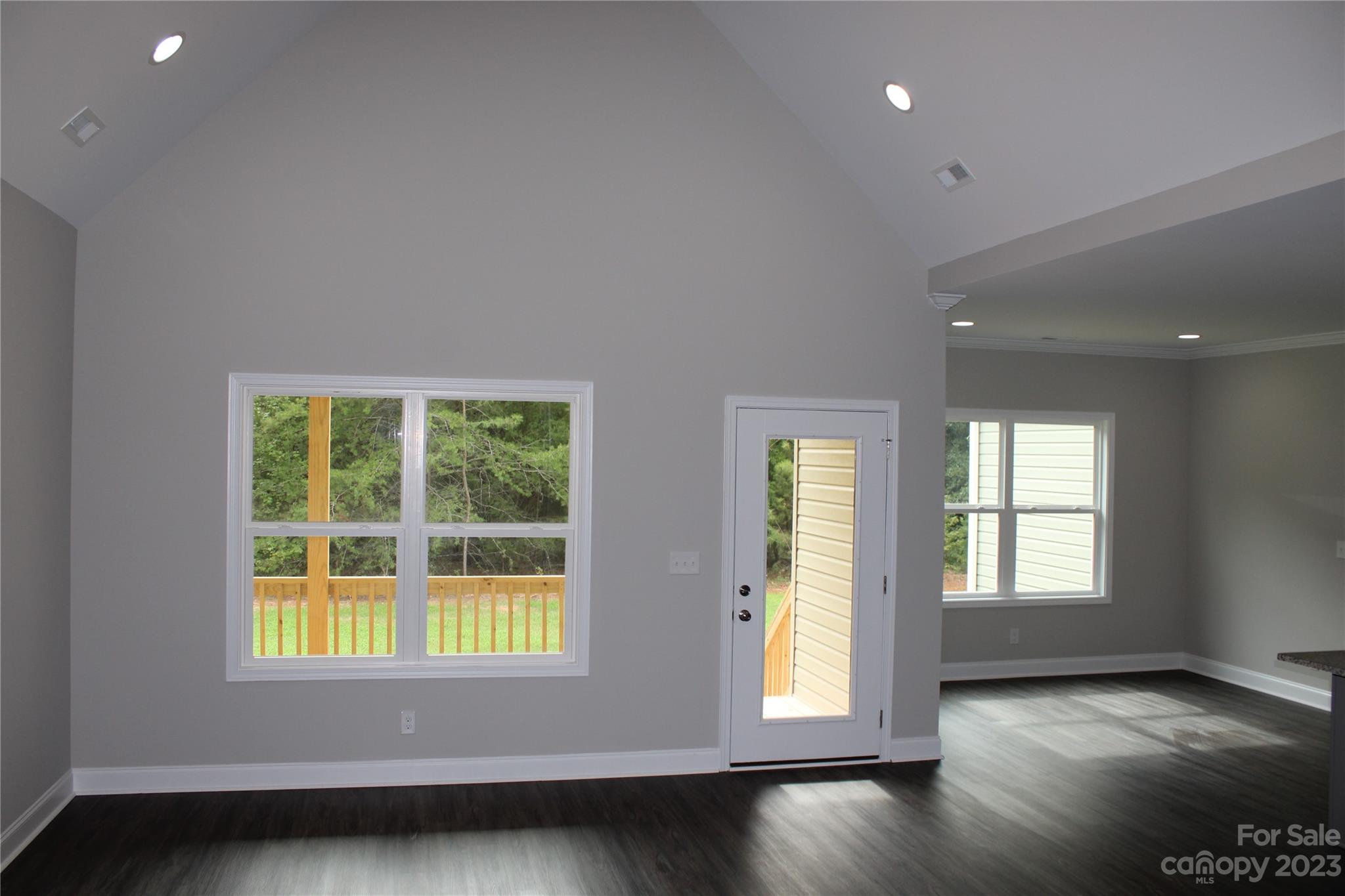 2323 State Rd S-46-172 Clover, SC 29710 - Photo 16 of 17 a view of an empty room with wooden floor and a window