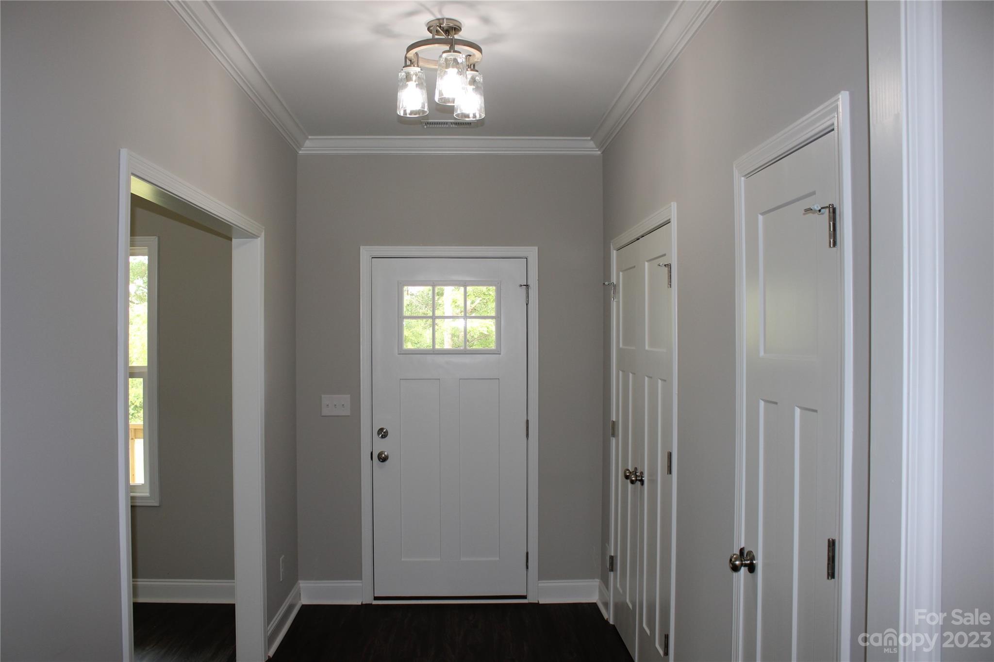 2323 State Rd S-46-172 Clover, SC 29710 - Photo 17 of 17 a view of a hallway with wooden shelves