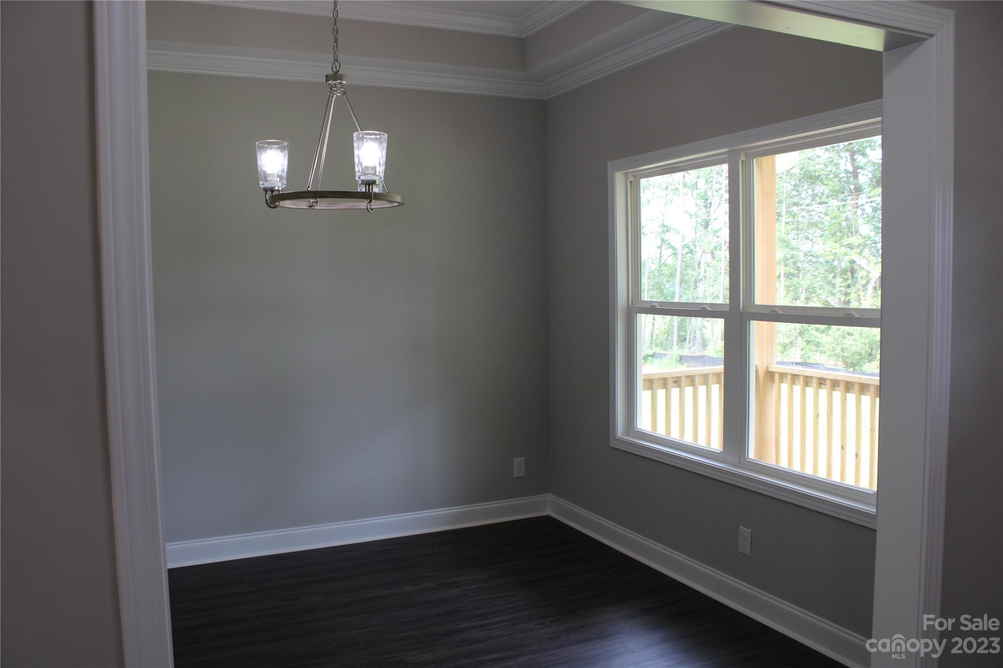 2323 State Rd S-46-172 Clover, SC 29710 - Photo 4 of 17 a view of empty room with wooden floor and fan