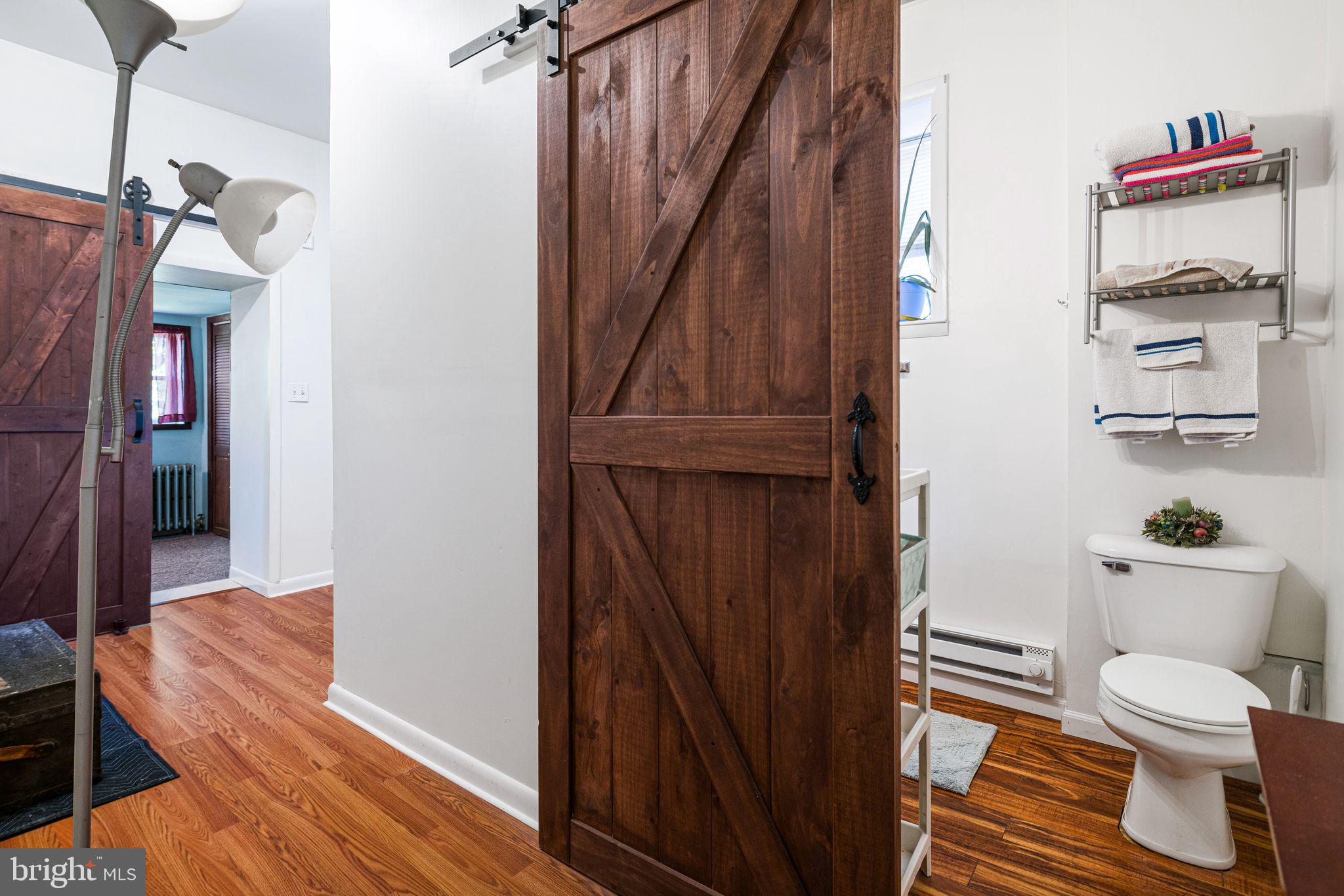354 Ripka Street Philadelphia, PA 19128 - Photo 15 of 23 a bathroom with a sink a toilet and shower