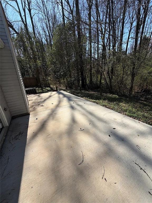 418 Engle Drive Tucker, GA 30084 - Photo 14 of 14 a view of a yard with trees