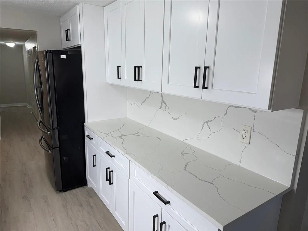 418 Engle Drive Tucker, GA 30084 - Photo 2 of 14 a spacious bathroom with a double vanity sink and mirror