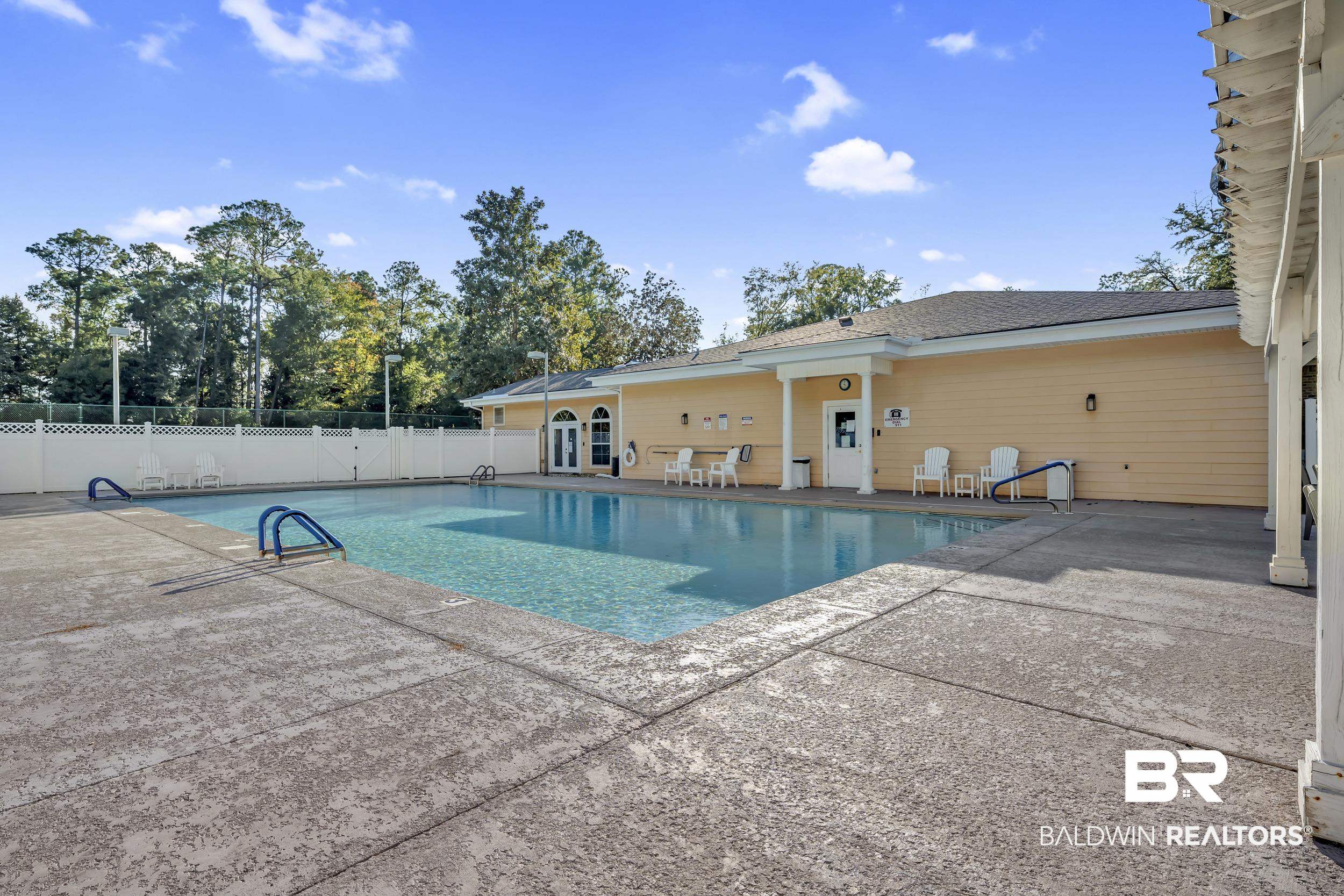 226 Hemingway Loop Foley, AL 36535 - Photo 47 of 53 Community pool with a patio