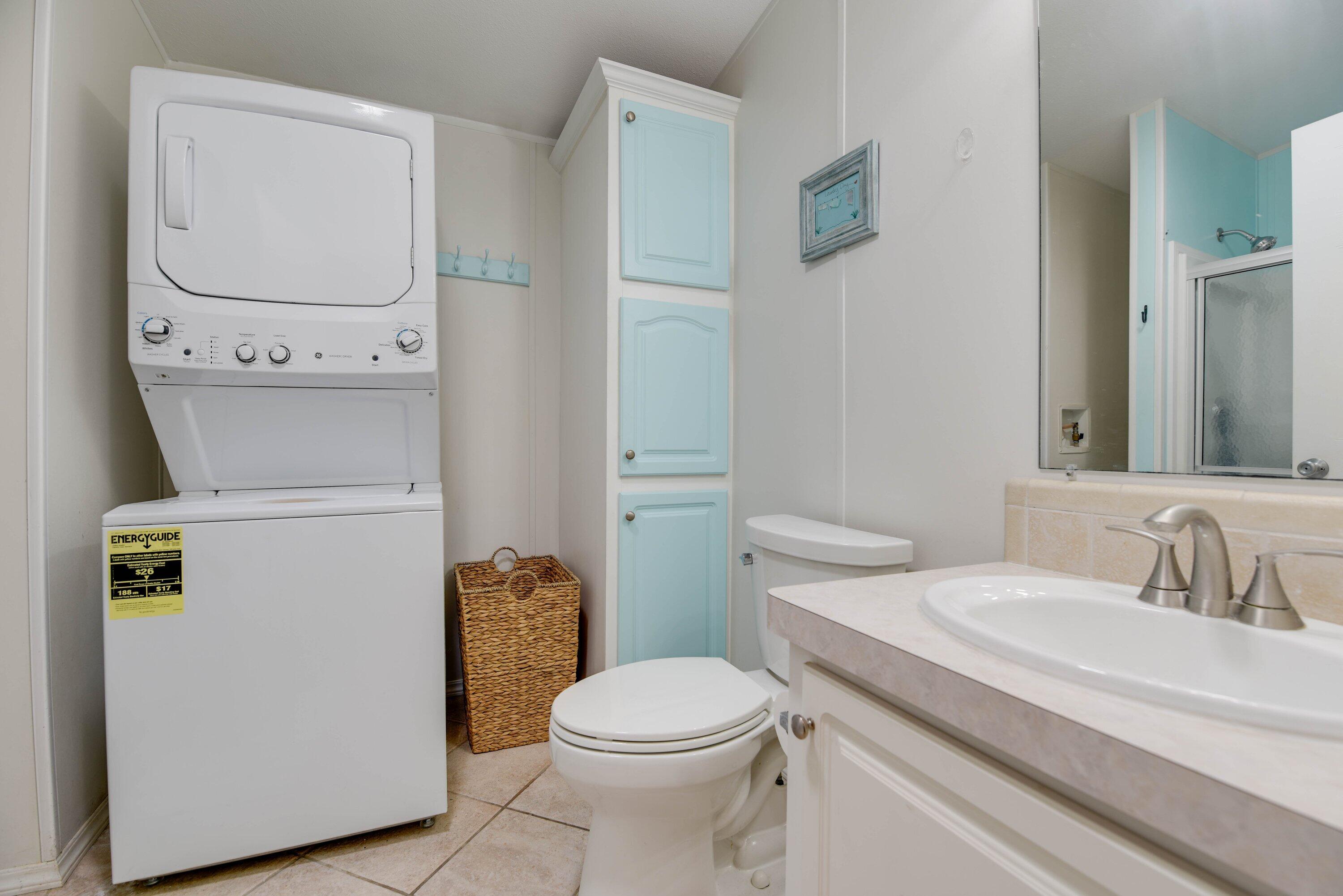 701 Spanish Main Drive, Unit 635 Cudjoe, FL 33042 - Photo 15 of 52 a bathroom with a sink a toilet and vanity
