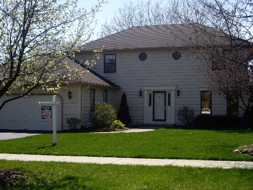 1164 Brighton Road Naperville, IL 60563 - Photo 1 of 1 a view of a house with a yard and plants
