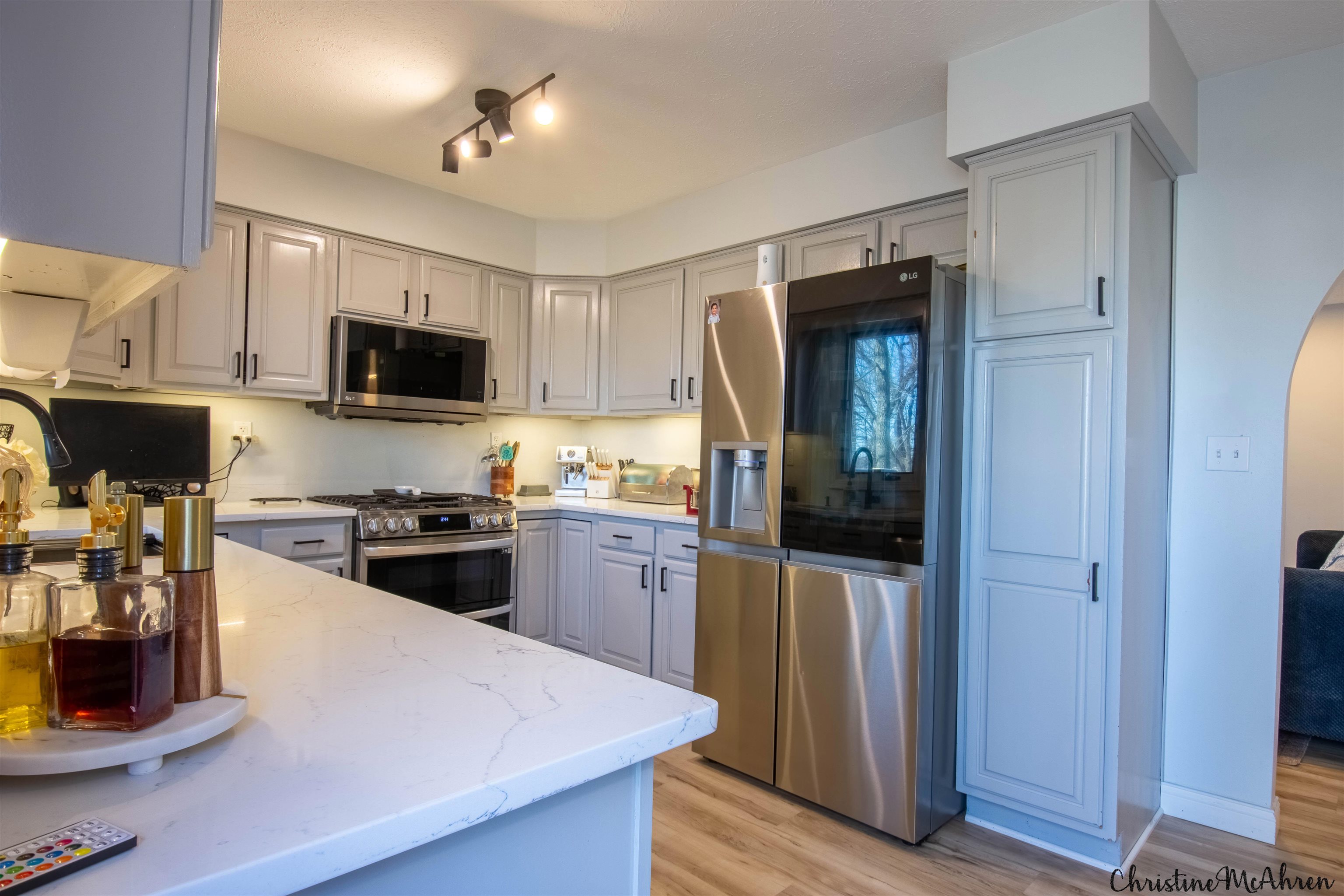 6410 Grassridge Road Rockford, IL 61108 - Photo 11 of 31 a kitchen with a refrigerator stove and sink