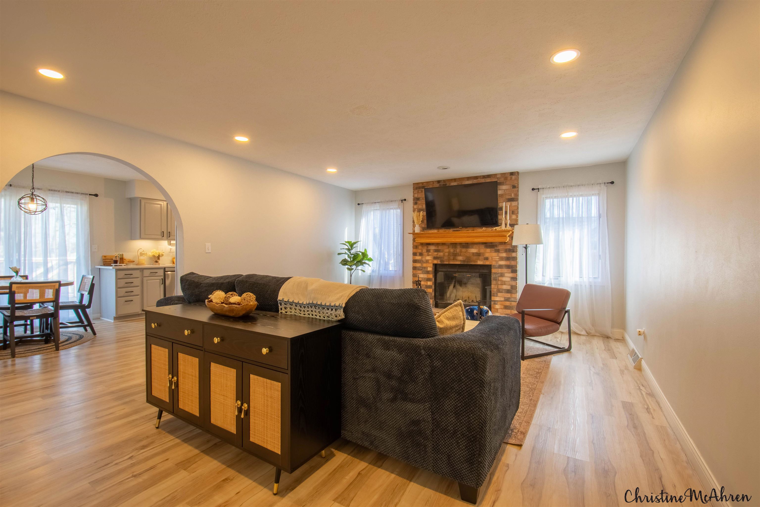 6410 Grassridge Road Rockford, IL 61108 - Photo 14 of 31 a living room with furniture and a fireplace