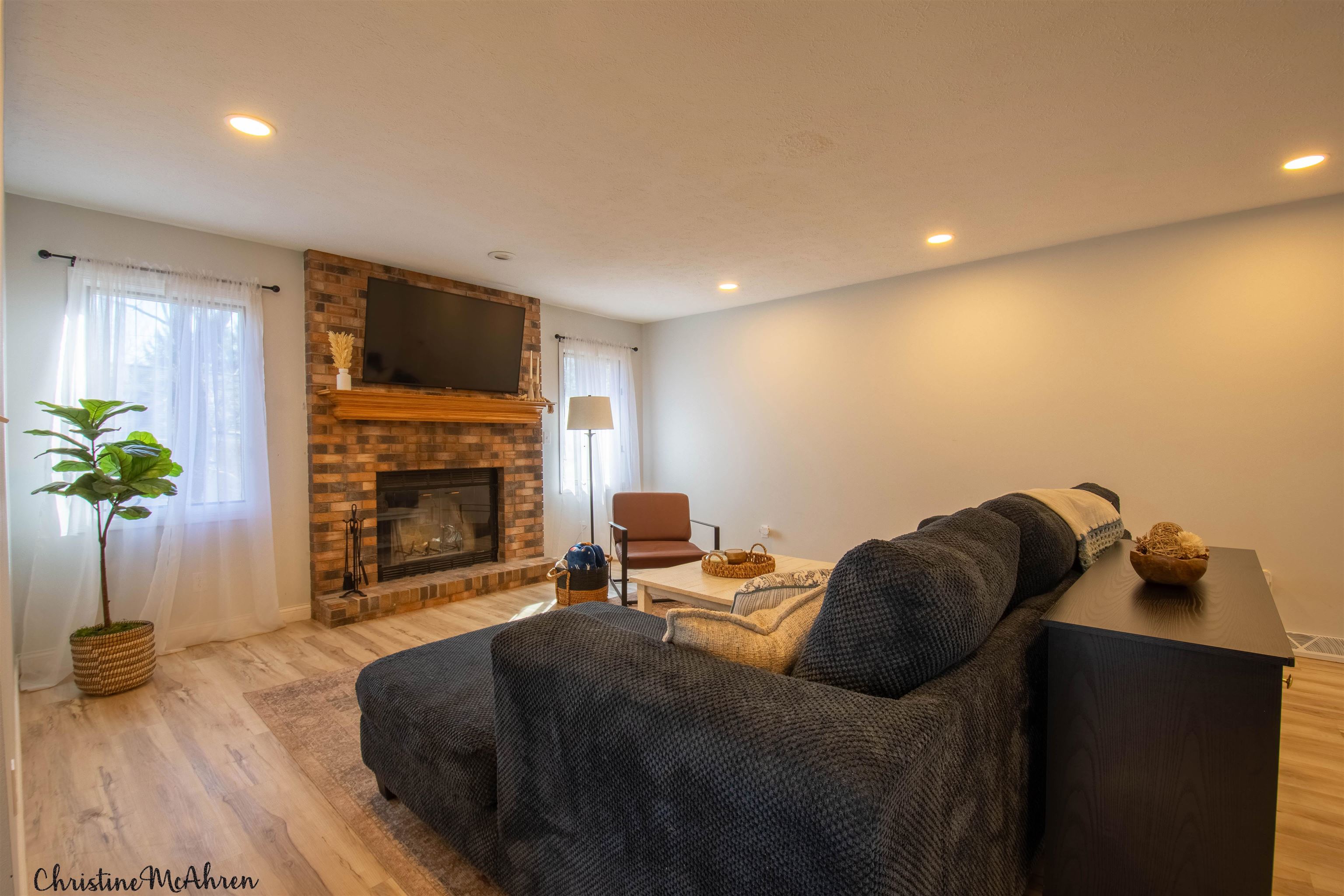 6410 Grassridge Road Rockford, IL 61108 - Photo 15 of 31 a bedroom with a bed and a fireplace