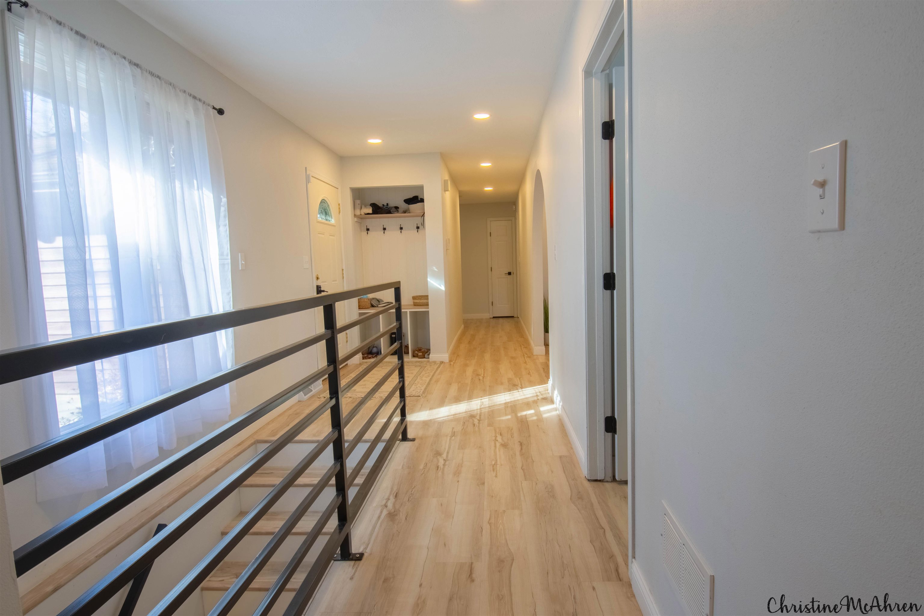 6410 Grassridge Road Rockford, IL 61108 - Photo 16 of 31 a view of a hallway with wooden floor