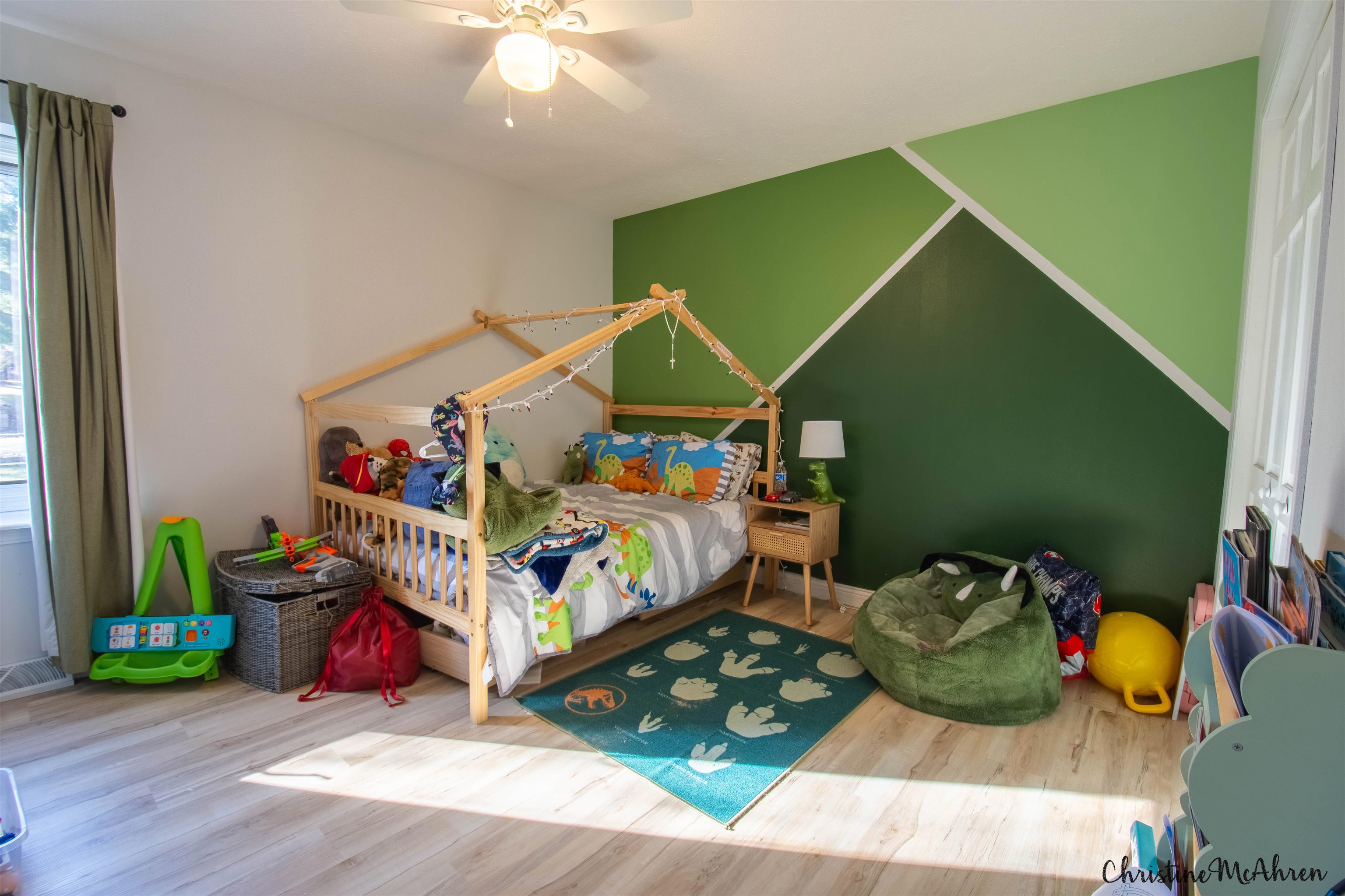 6410 Grassridge Road Rockford, IL 61108 - Photo 20 of 31 a bedroom with bed and a wooden floor