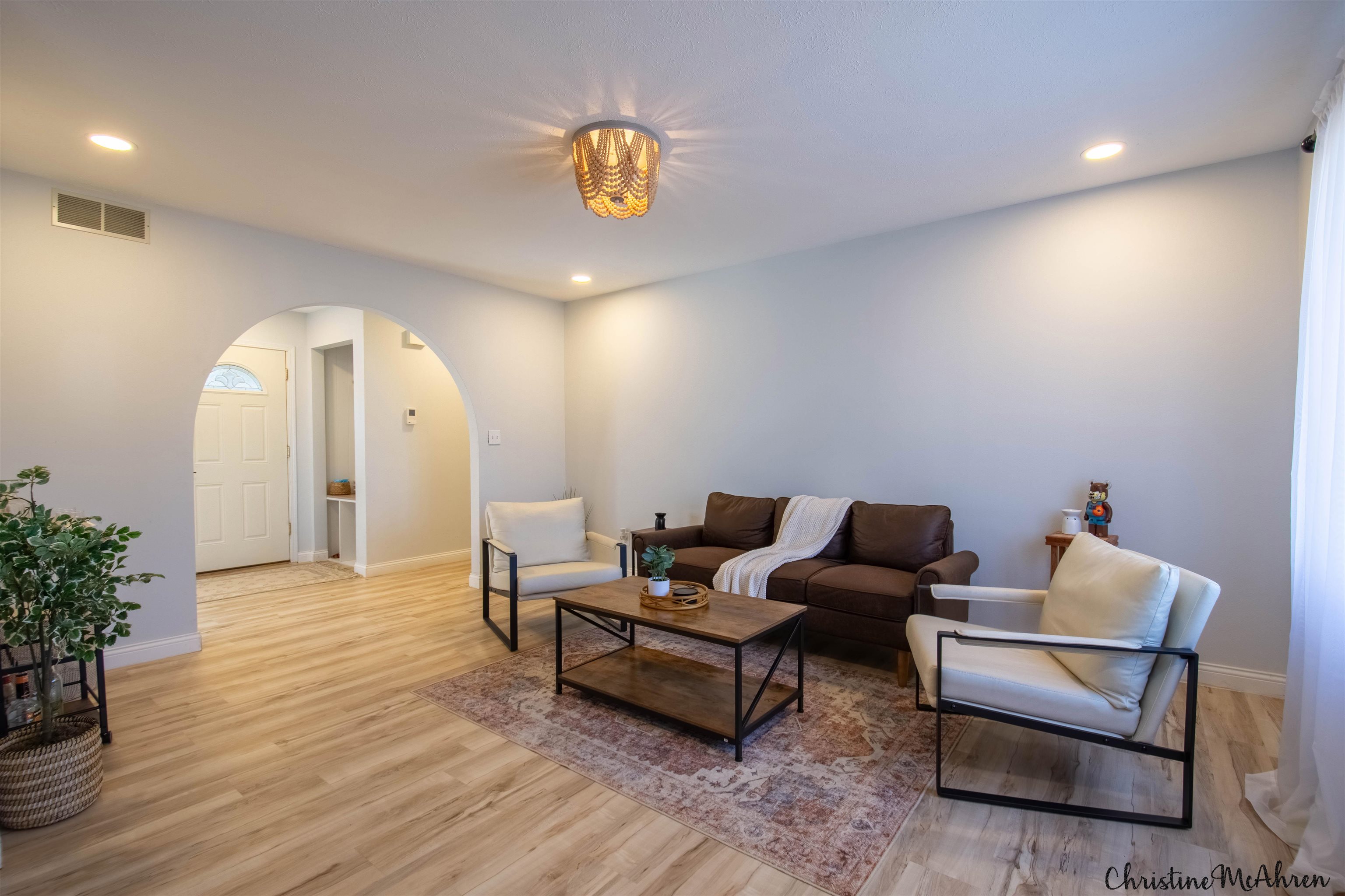 6410 Grassridge Road Rockford, IL 61108 - Photo 6 of 31 a living room with furniture and wooden floor