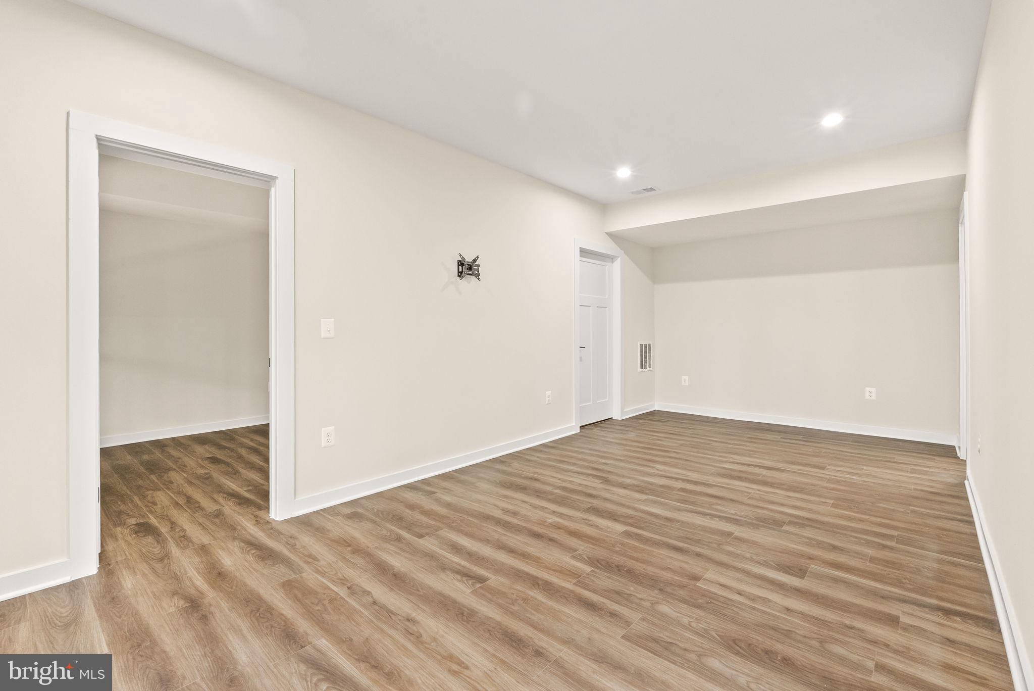 4769 Blue Mountain Road Linden, VA 22642 - Photo 17 of 36 a view of empty room with wooden floor