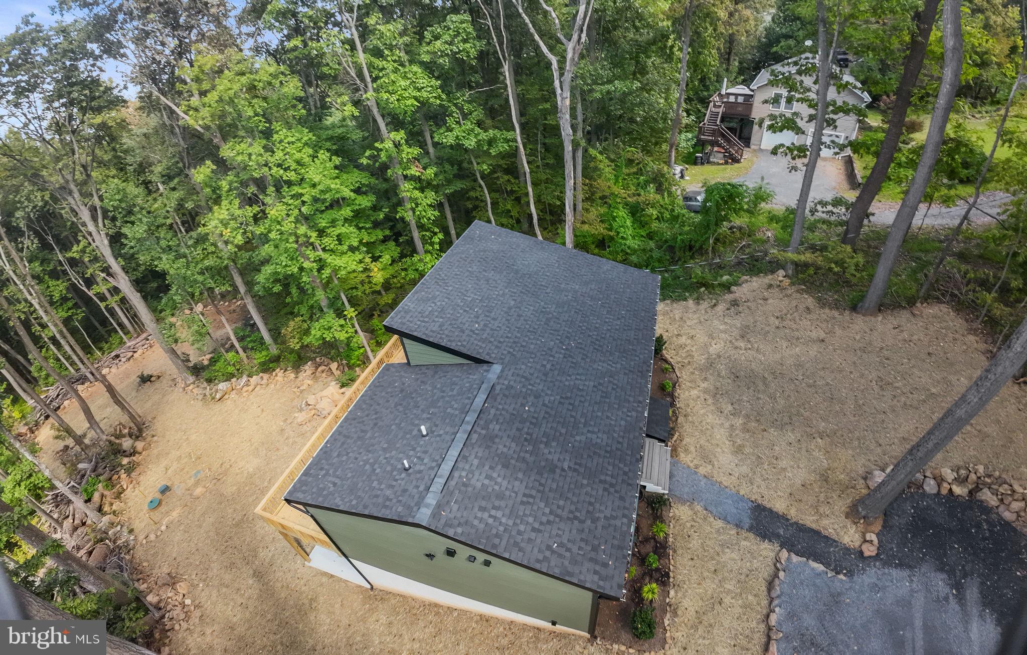 4769 Blue Mountain Road Linden, VA 22642 - Photo 31 of 36 a view of a backyard with potted plants