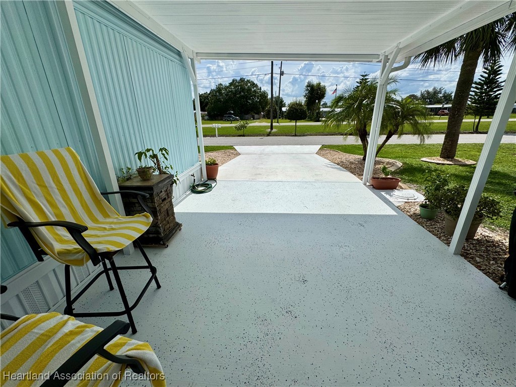 2940 Louis Street Sebring, FL 33872 - Photo 32 of 47 a view of swimming pool from a balcony