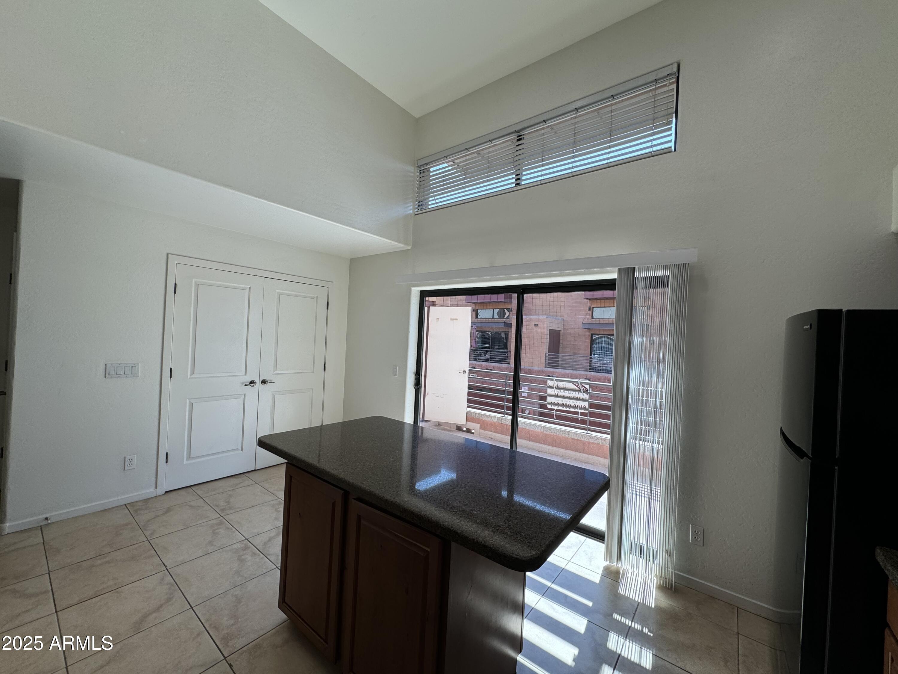 305 South Wilson Street, Unit 111 Tempe, AZ 85281 - Photo 3 of 48 a room with a table and chairs
