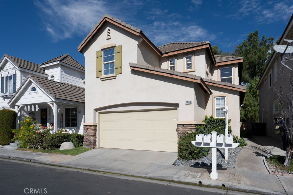 23321 Beachcomber Lane Valencia, CA 91355 - Photo 2 of 40 Alternate front exterior view of the home at 23321 Beachcomber Lane — classic curb appeal in Santa Clarita’s Bridgeport community.