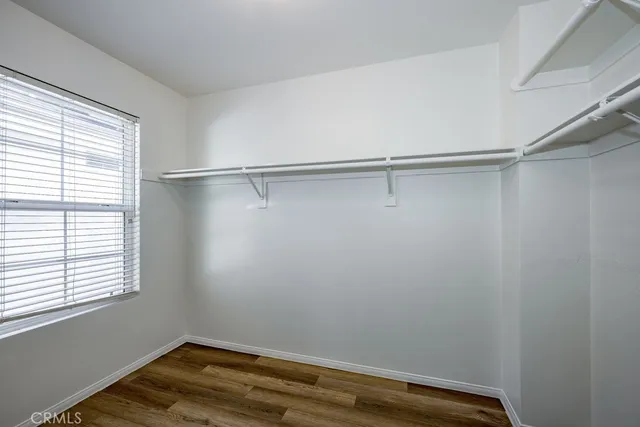 a view of a room with racks on the wall