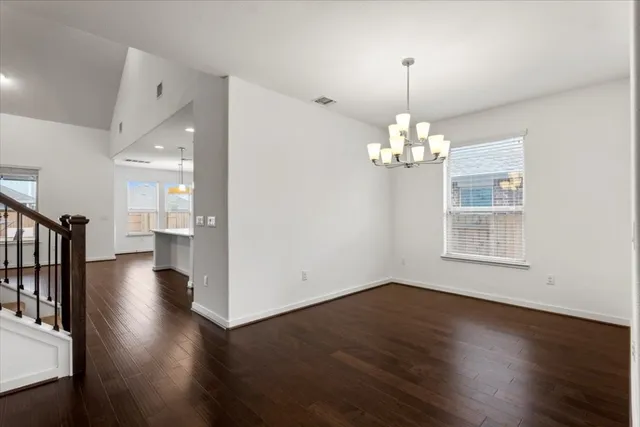 a view of entryway with wooden floor