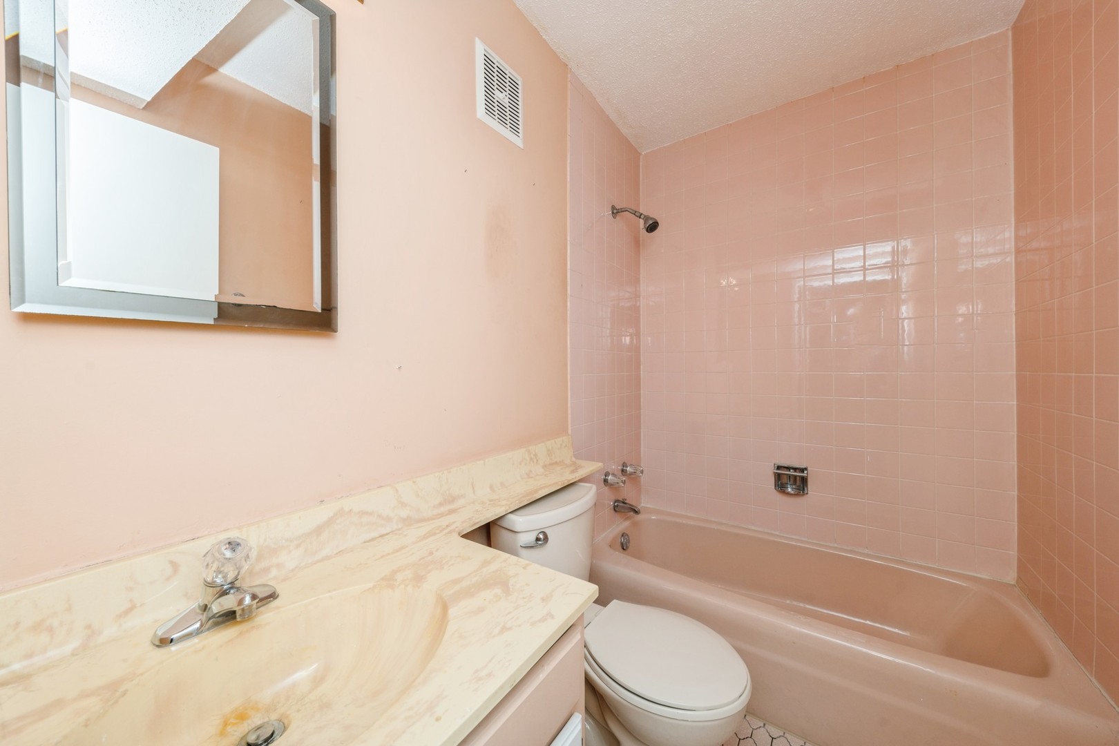 5471 South Hyde Park Boulevard, Unit 16AB Chicago, IL 60615 - Photo 14 of 18 a bathroom with a sink toilet and shower