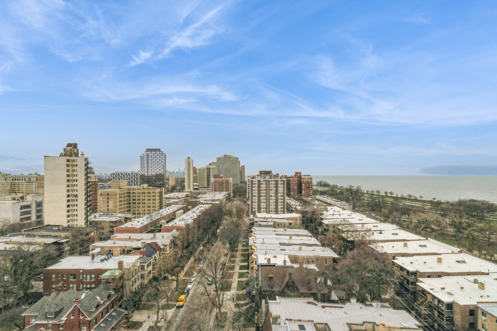 5471 South Hyde Park Boulevard, Unit 16AB Chicago, IL 60615 - Photo 17 of 18 a view of a city with ocean