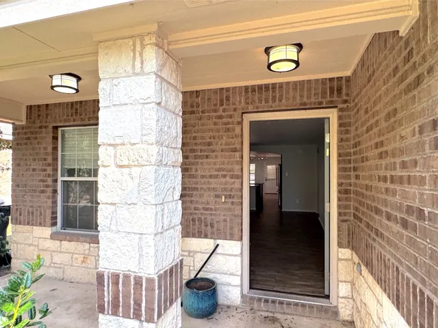 a front view of a house with a shower